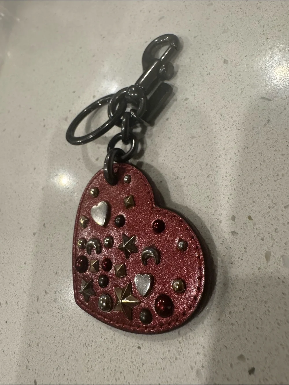 Coach red metallic